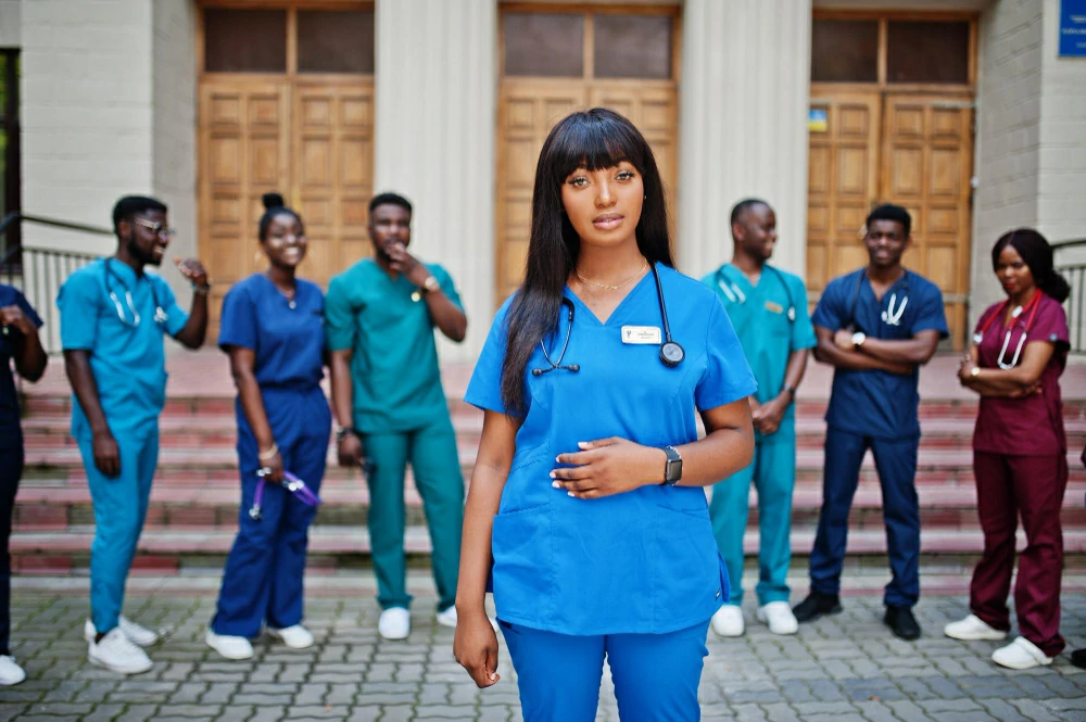 nurse standing in front of peers